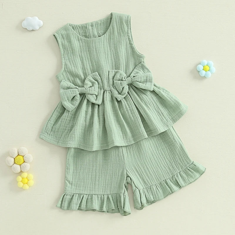 Lioraitiin Toddler Girl Summer Clothes Solid Color Bow Round Neck Tank Tops + Elastic Waist Ruffled Shorts Set