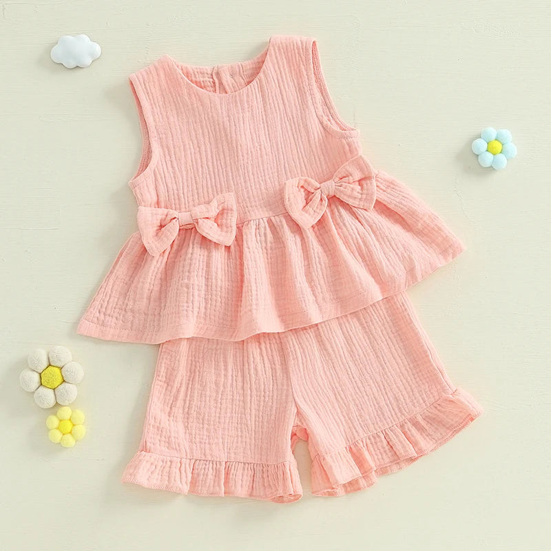 Lioraitiin Toddler Girl Summer Clothes Solid Color Bow Round Neck Tank Tops + Elastic Waist Ruffled Shorts Set