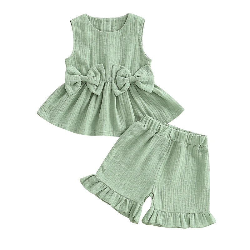 Lioraitiin Toddler Girl Summer Clothes Solid Color Bow Round Neck Tank Tops + Elastic Waist Ruffled Shorts Set